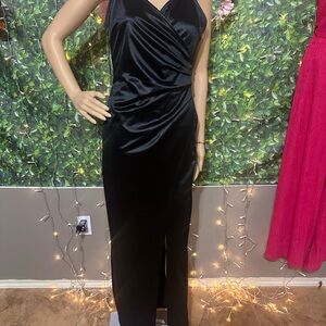 Black satin evening gown. NWT never worn. Strechy material true to size.